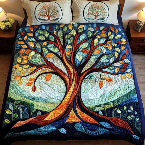 Seeds of Unity quilted 3-piece bedding set on a made bed with two matching pillow shams