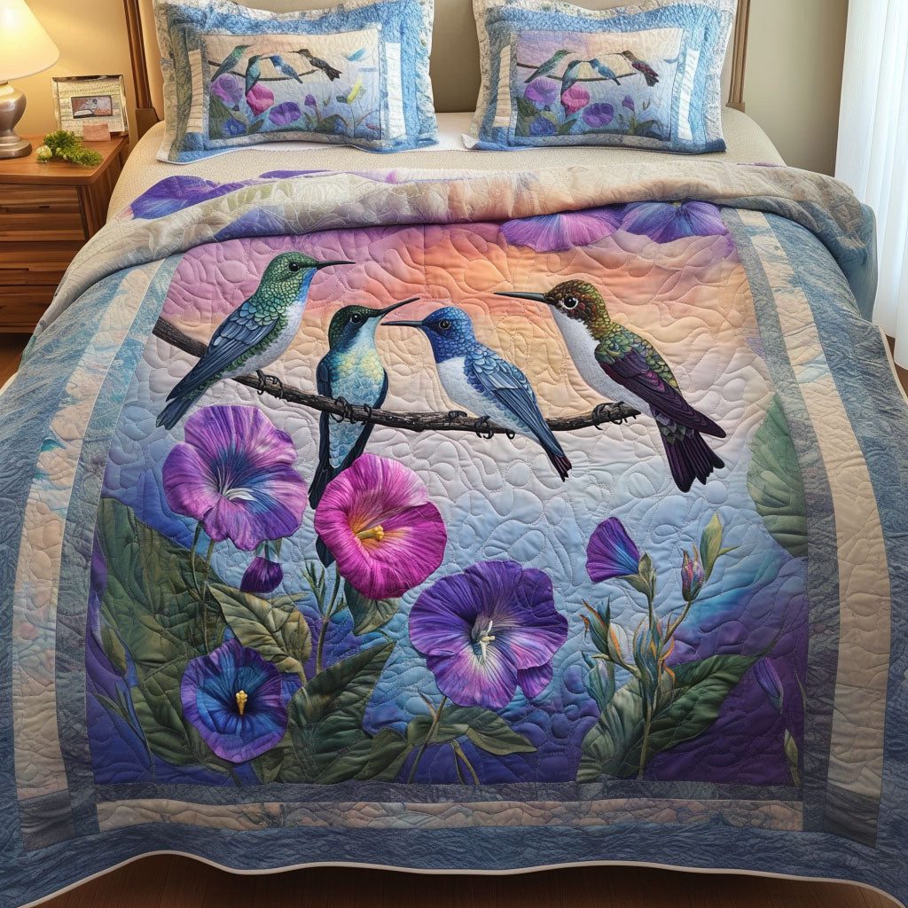 Serenade in Petals quilted 3-piece bedding set on a made bed with two matching pillow shams