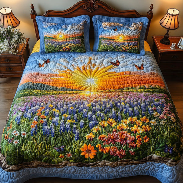 Serene Bluebonnet quilted 3-piece bedding set on a made bed with two matching pillow shams