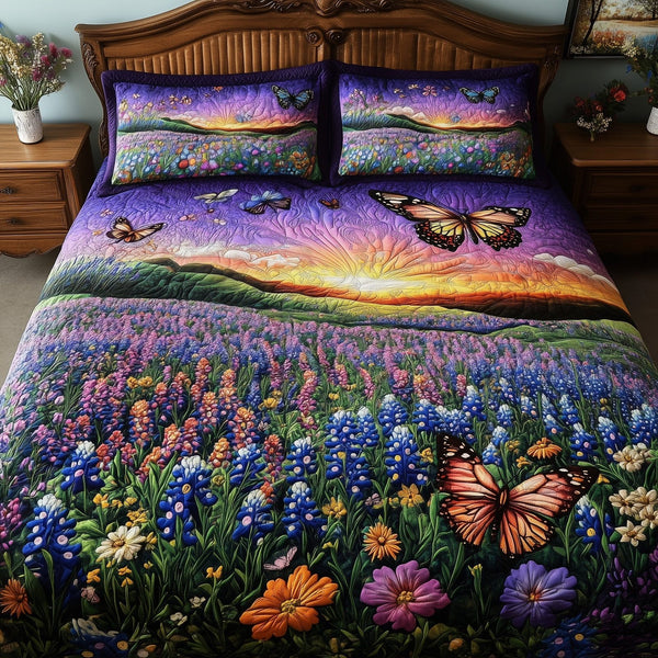 Serene Bluebonnet quilted 3-piece bedding set on a made bed with two matching pillow shams