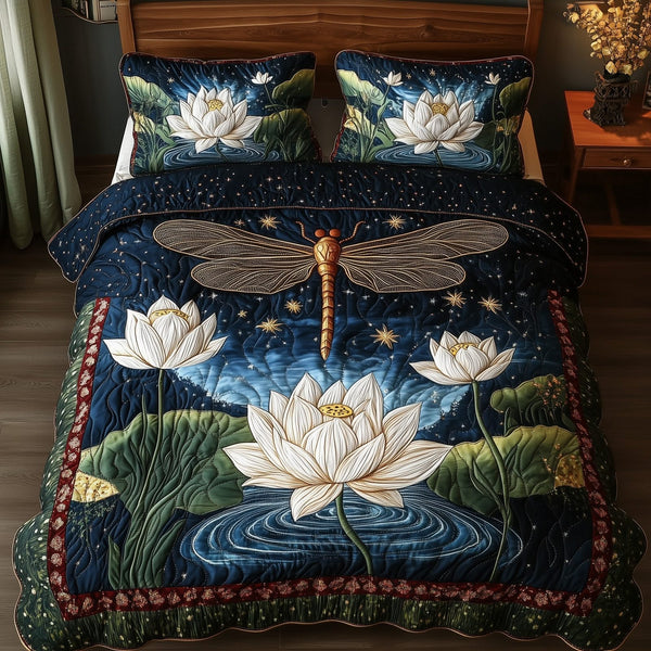 Serene Dragonfly quilted 3-piece bedding set on a made bed with two matching pillow shams