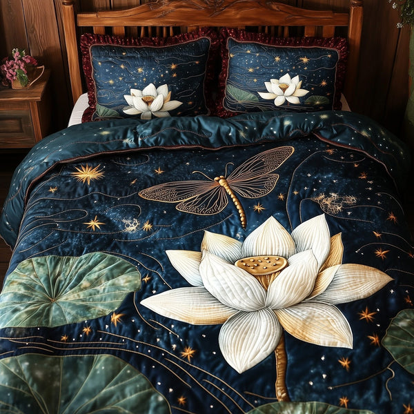 Serene Dragonfly quilted 3-piece bedding set on a made bed with two matching pillow shams