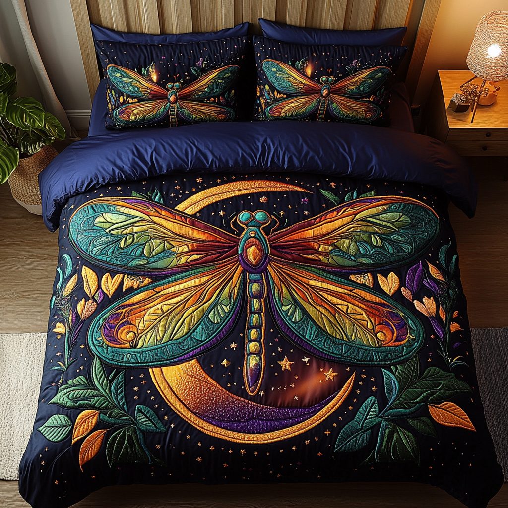 Serene Dragonfly quilted 3-piece bedding set on a made bed with two matching pillow shams