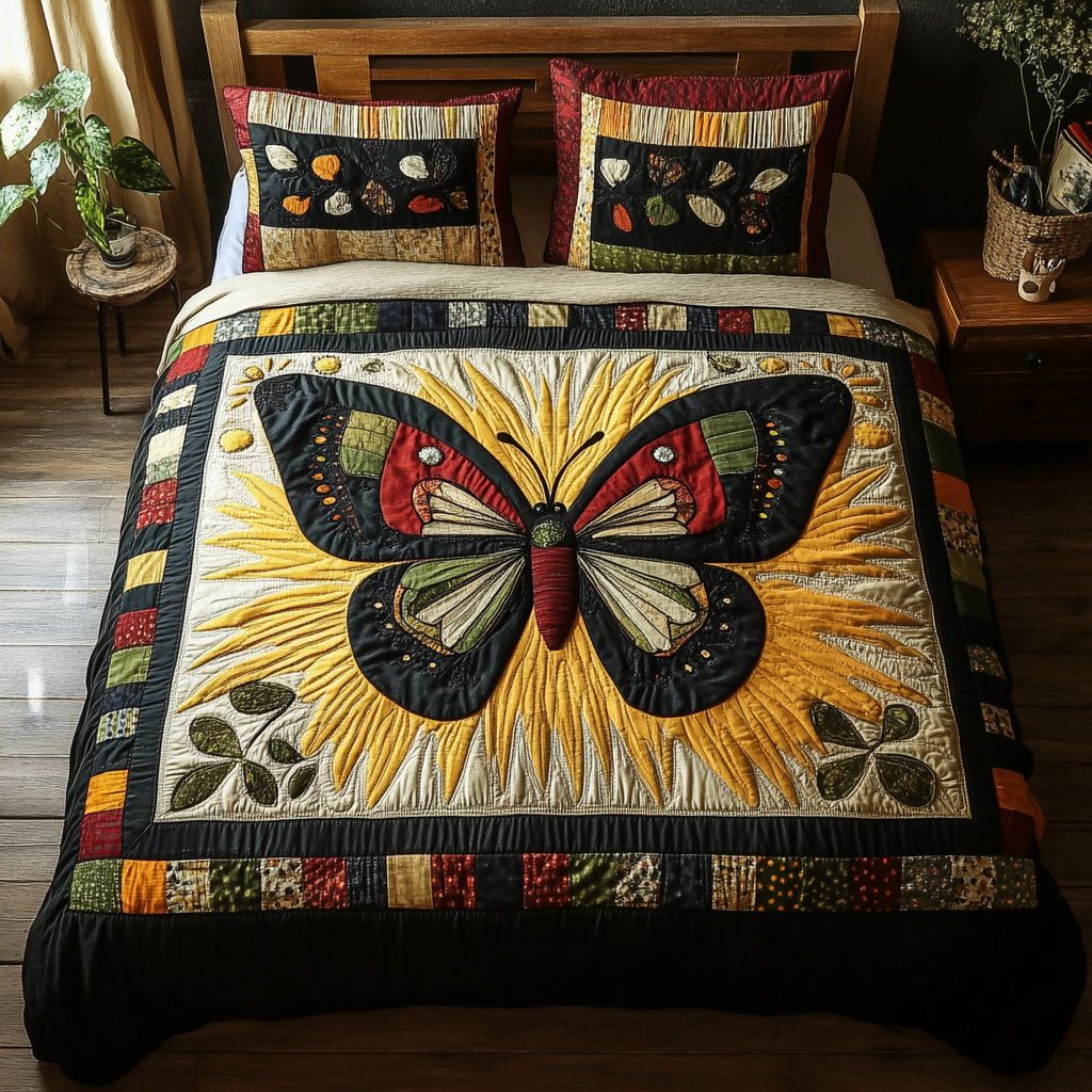 Serene Flight quilted 3-piece bedding set on a made bed with two matching pillow shams