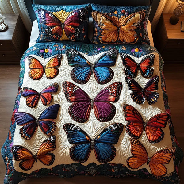 Serene Soar quilted 3-piece bedding set on a made bed with two matching pillow shams