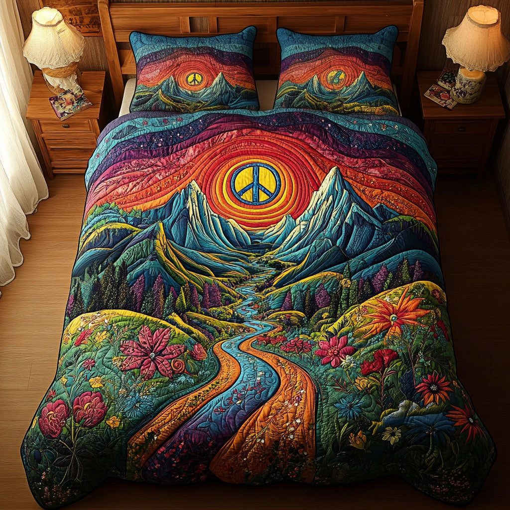 Serenity Summit quilted 3-piece bedding set on a made bed with two matching pillow shams