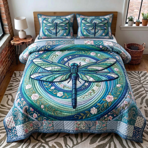 Serenity Wings quilted 3-piece bedding set on a made bed with two matching pillow shams