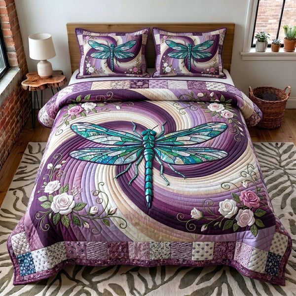 Serenity Wings quilted 3-piece bedding set on a made bed with two matching pillow shams