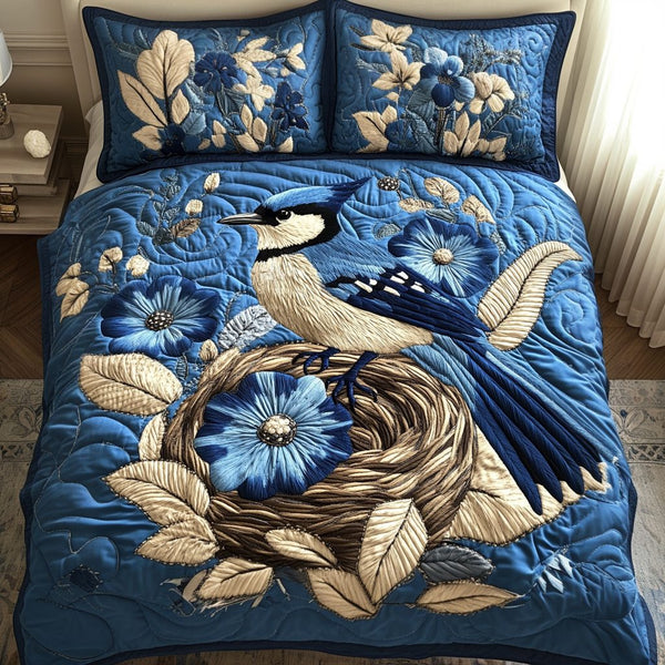Serenity Wings quilted 3-piece bedding set on a made bed with two matching pillow shams