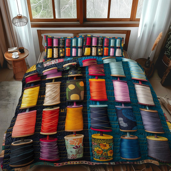 Sewing Studio quilted 3-piece bedding set on a made bed with two matching pillow shams