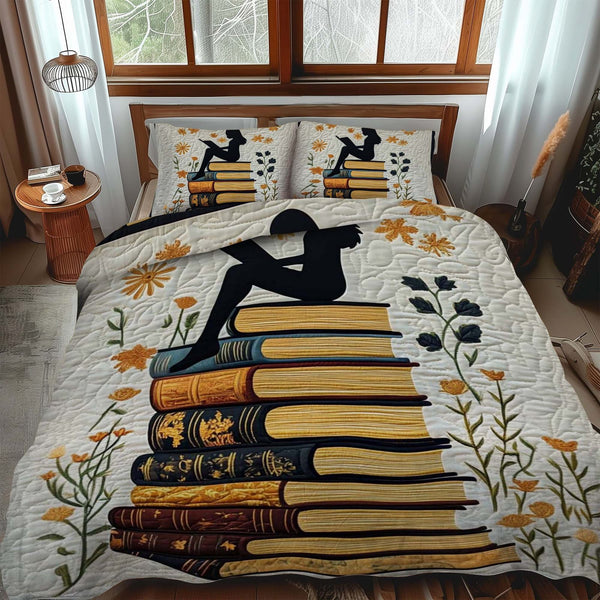 Shadow Of A Reader quilted 3-piece bedding set on a made bed with two matching pillow shams