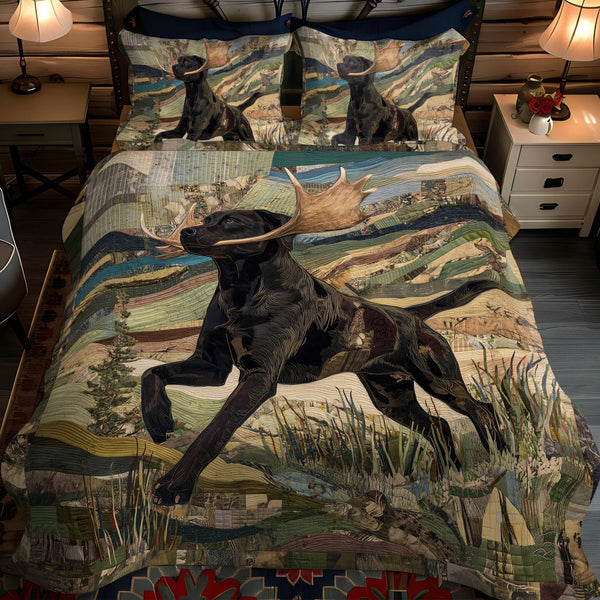 Shadow Tracker quilted 3-piece bedding set on a made bed with two matching pillow shams