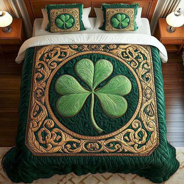 Shamrock Dreams quilted 3-piece bedding set on a made bed with two matching pillow shams