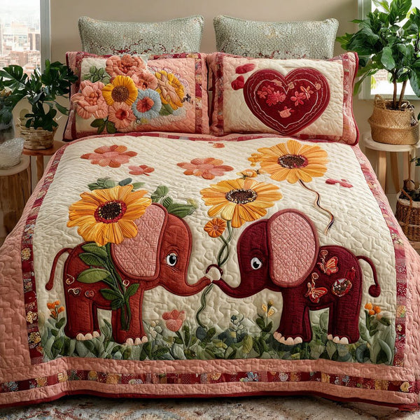 Shared Moments quilted 3-piece bedding set on a made bed with two matching pillow shams