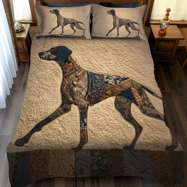 Sharp Scout quilted 3-piece bedding set on a made bed with two matching pillow shams