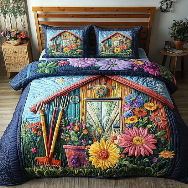 Shed Paradise quilted 3-piece bedding set on a made bed with two matching pillow shams