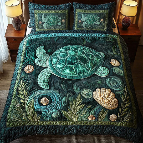 Shell Harmony quilted 3-piece bedding set on a made bed in a light coastal bedroom