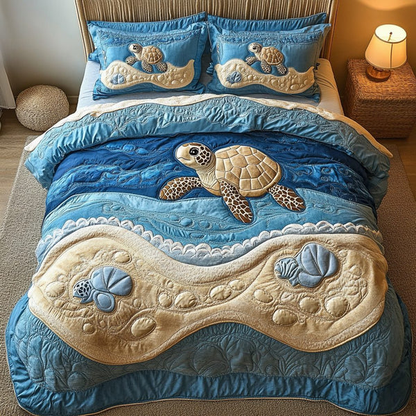 Shell Serenity quilted 3-piece bedding set on a made bed in a light coastal bedroom