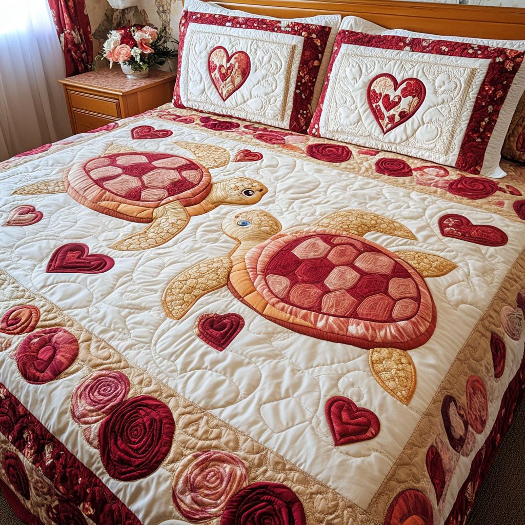 Shellbound Love quilted 3-piece bedding set on a made bed with two matching pillow shams