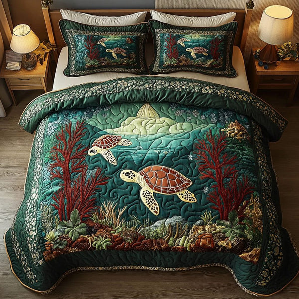 Shelled Serenity quilted 3-piece bedding set on a made bed with two matching pillow shams