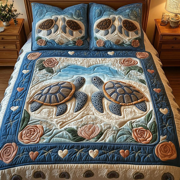 Shellmates quilted 3-piece bedding set on a made bed with two matching pillow shams