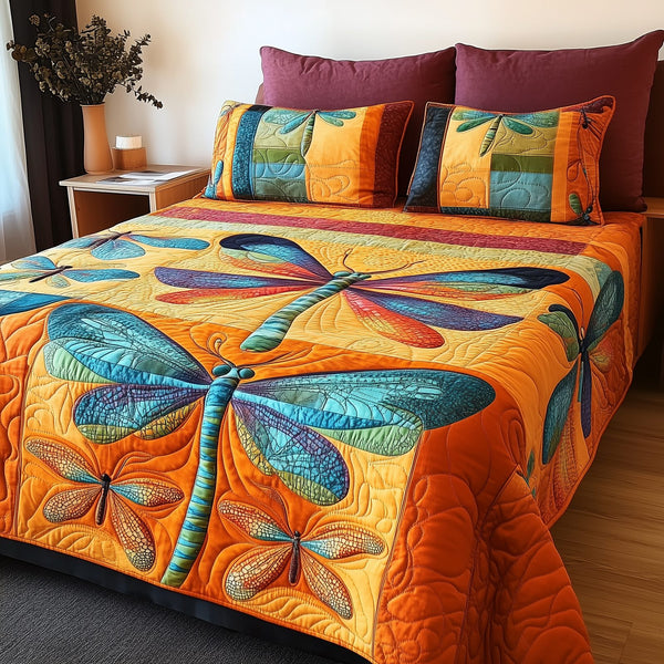 Shining Dragonfly quilted 3-piece bedding set on a made bed with two matching pillow shams