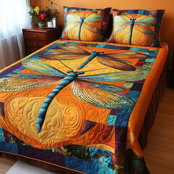 Shining Dragonfly quilted 3-piece bedding set on a made bed with two matching pillow shams