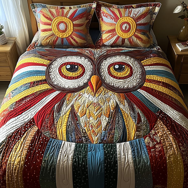 Shining Owl quilted 3-piece bedding set on a made bed with two matching pillow shams
