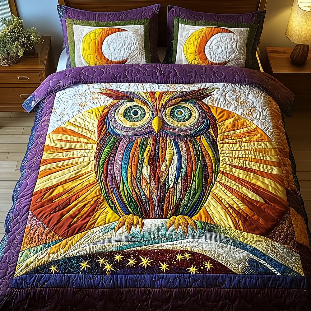 Shining Owl quilted 3-piece bedding set on a made bed with two matching pillow shams