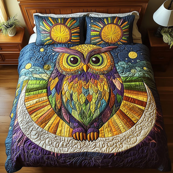 Shining Owl quilted 3-piece bedding set on a made bed with two matching pillow shams