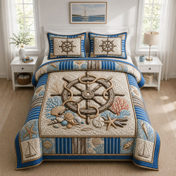 Ship Wheel Coastal quilted 3-piece bedding set on a made bed in a light coastal bedroom