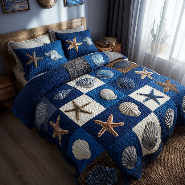 Shoreline Gems quilted 3-piece bedding set on a made bed in a light coastal bedroom