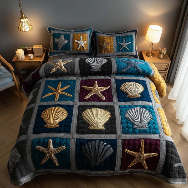Shoreline Gems quilted 3-piece bedding set on a made bed in a light coastal bedroom
