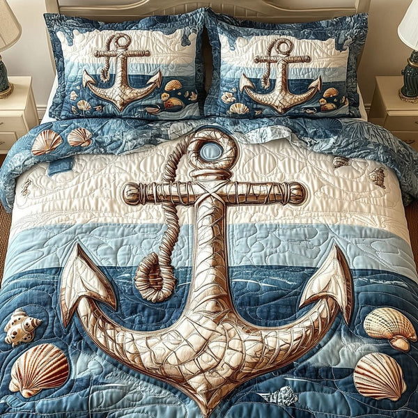 Shoreline Slumber quilted 3-piece bedding set on a made bed in a light coastal bedroom