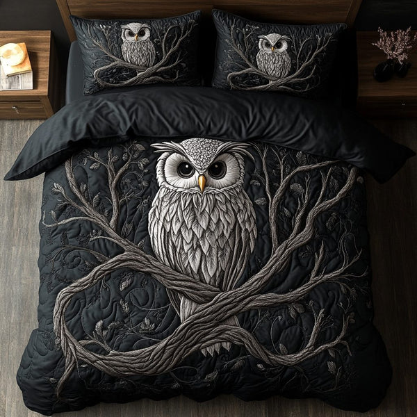 Silent Watcher quilted 3-piece bedding set on a made bed with two matching pillow shams