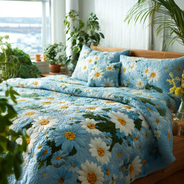 Sky Daisies quilted 3-piece bedding set on a made bed with two matching pillow shams