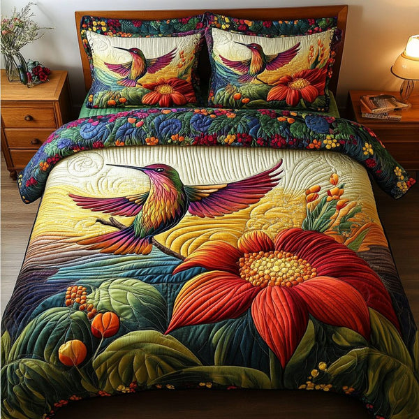 Sky Dance quilted 3-piece bedding set on a made bed with two matching pillow shams