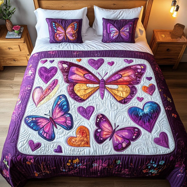 Sky Dancers quilted 3-piece bedding set on a made bed with two matching pillow shams