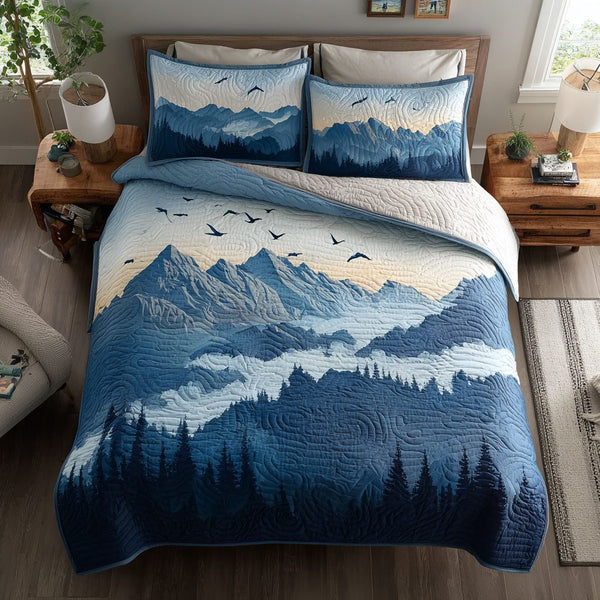Sky Flight quilted 3-piece bedding set on a made bed with two matching pillow shams