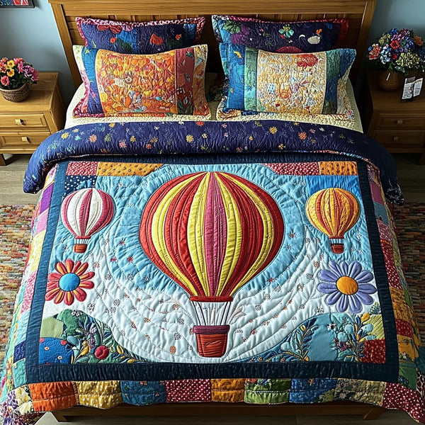 Skybound Serenity quilted 3-piece bedding set on a made bed with two matching pillow shams