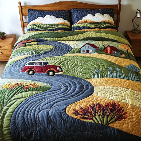 Skyward Dream quilted 3-piece bedding set on a made bed with two matching pillow shams