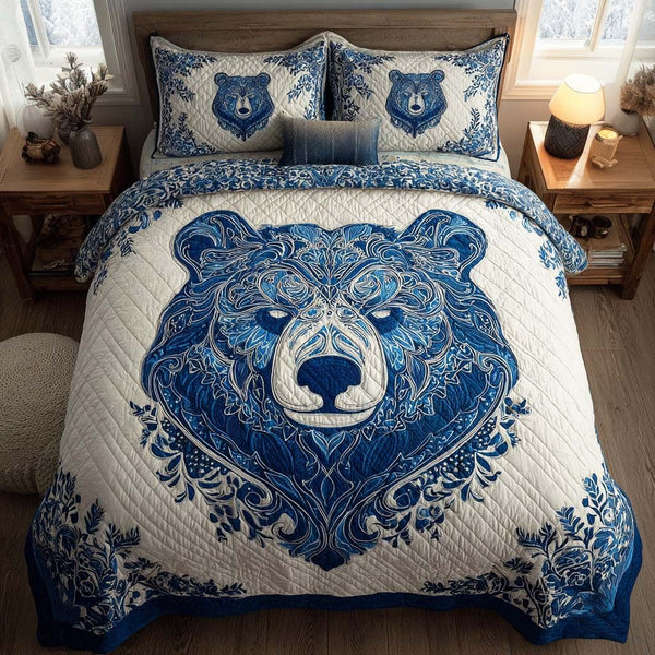 Slate Roar quilted 3-piece bedding set on a made bed with two matching pillow shams