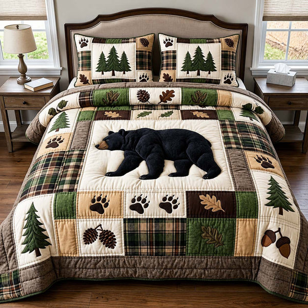 Sleeping Bear quilted 3-piece bedding set on a made bed with two matching pillow shams