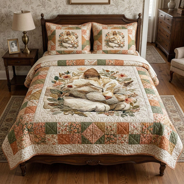 Sleeping Cat Garden quilted 3-piece bedding set on a made bed with two matching pillow shams