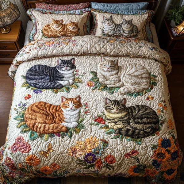 Sleepy Cat Magic quilted 3-piece bedding set on a made bed with two matching pillow shams