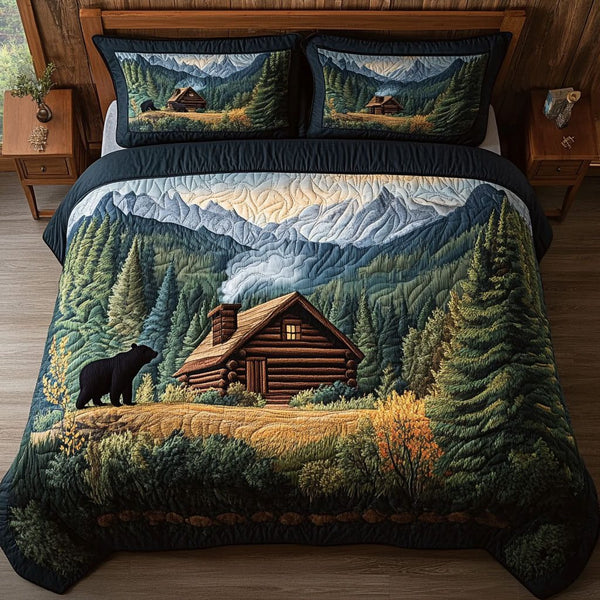 Smoky Log Haven quilted 3-piece bedding set on a made bed with two matching pillow shams