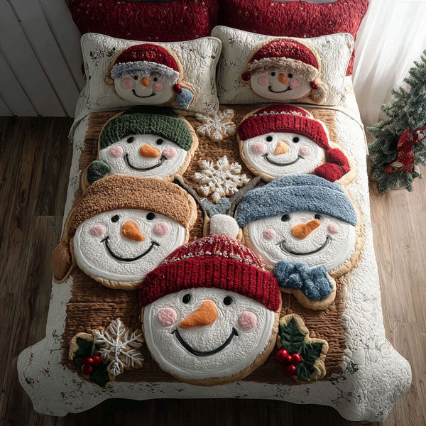 Snow Buddies quilted 3-piece bedding set on a made bed with two matching pillow shams