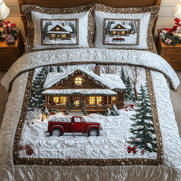 Snow Cabin quilted 3-piece bedding set on a made bed with two matching pillow shams