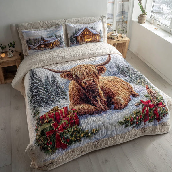 Snow Highland Cow quilted 3-piece bedding set on a made bed with two matching pillow shams