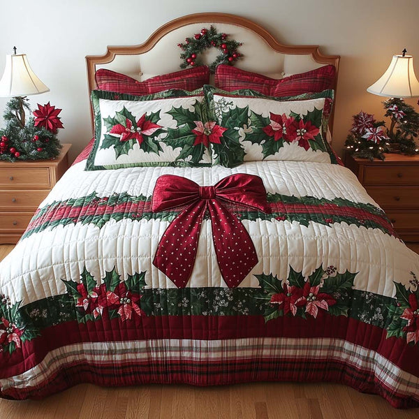 Snowberry Bow quilted 3-piece bedding set on a made bed with two matching pillow shams